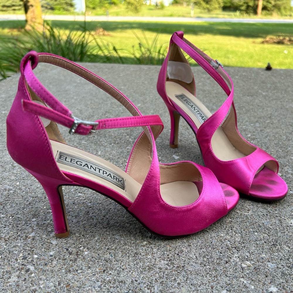 2 in heels. magenta with rhinestone buckle